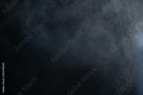 Water spray dust on dark background. Spraying mist effect isolated on black background.