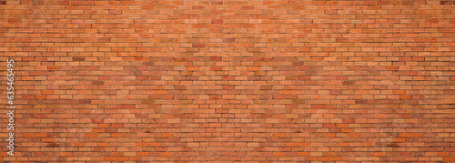 Panoramic background of wide old red brick wall