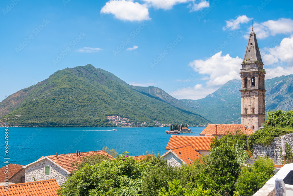 Aerial view of Kotor bay with island St. George and medieval church in Perast town on Adriatic sea in Montenegro in sunny day