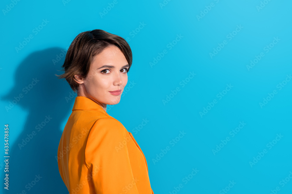 Portrait of nice young woman wear yellow blazer posing monthly best employer successful business lady isolated on blue color background Portrait of nice young woman wear yellow blazer posing monthly best employer successful business lady isolated on blue color background