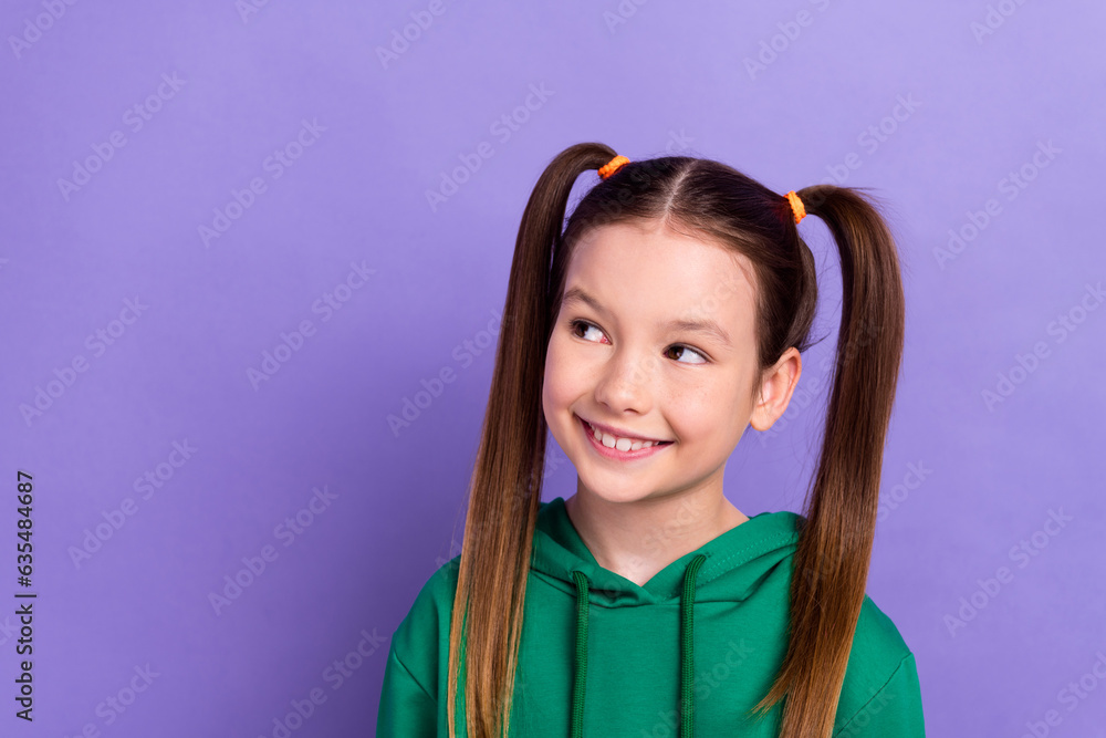 Photo of adorable little pupil girl looking empty space have tricky idea overthinking isolated purple color background Photo of adorable little pupil girl looking empty space have tricky idea overthinking isolated purple color background