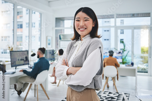 Canvas Print Happy, woman and Asian employee with arms crossed in office, workplace and confident in working for professional startup