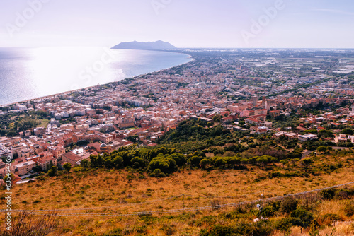 Panoramic sea landscape with Terracina, Lazio, Italy. Scenic resort town village with nice sand beach and clear blue water. Famous tourist destination in Riviera de Ulisse photo