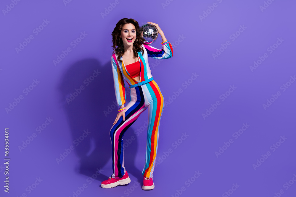 Photo of excited lady dj enjoy friday weekend party bring glitter glowing disco ball isolated on bright color background Photo of excited lady dj enjoy friday weekend party bring glitter glowing disco ball isolated on bright color background