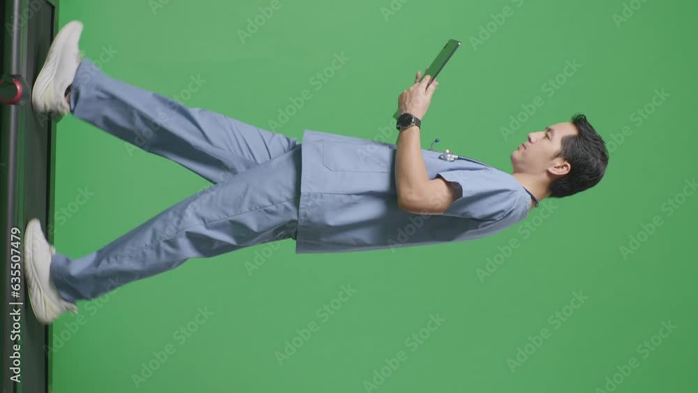 Full Body Of Side View Asian Male Doctor With Stethoscope Using A Tablet While Walking On Green Screen Background In The Hospital
Full Body Of Side View Asian Male Doctor With Stethoscope Using A Tablet While Walking On Green Screen Background In The Hospital