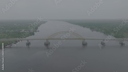 A long bridge in a city of tembilahan that is the only link between the city and other areas. photo