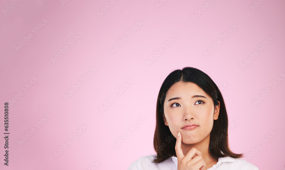 Asian woman, thinking and mockup space in solution, memory or ideas against a pink studio background. Female person in problem solving, reminder or plan emoji in decision or brainstorming on mock up Asian woman, thinking and mockup space in solution, memory or ideas against a pink studio background. Female person in problem solving, reminder or plan emoji in decision or brainstorming on mock up