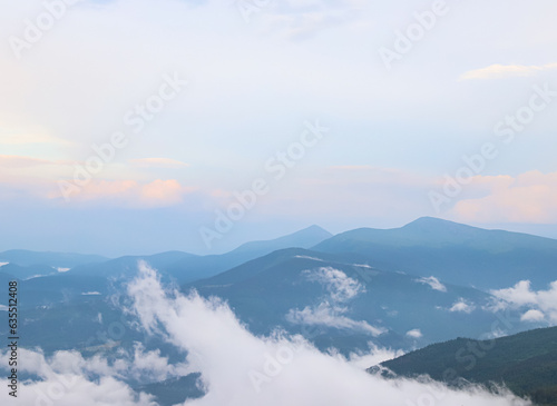 Clouds above the mountains after the rain