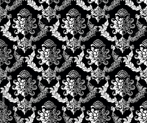 Wallpaper in the style of Baroque. Seamless vector background. White and black floral ornament. Graphic pattern for fabric, wallpaper, packaging. Ornate Damask flower ornament