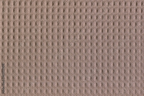 The texture of natural cotton fabric is brown. Simple coarse fabric, homemade soft cotton napkin. The usual background of a duster.