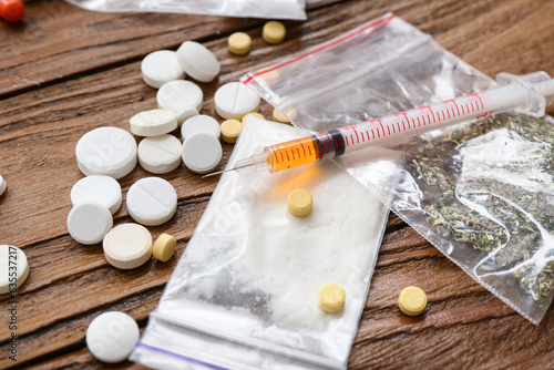 Syringe and different drugs...