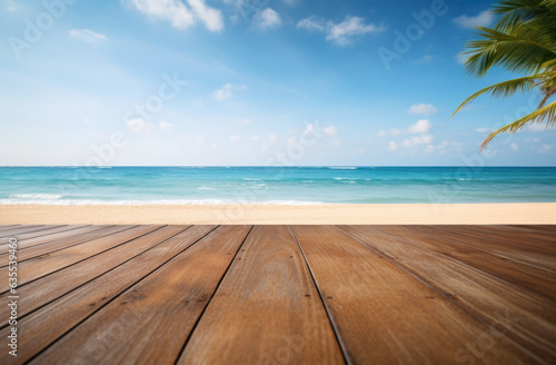 an old wooden deck on the beach with the ocean looking out © Vodkaz