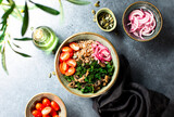 Kale and buckweat vegan bowl with marinated onion