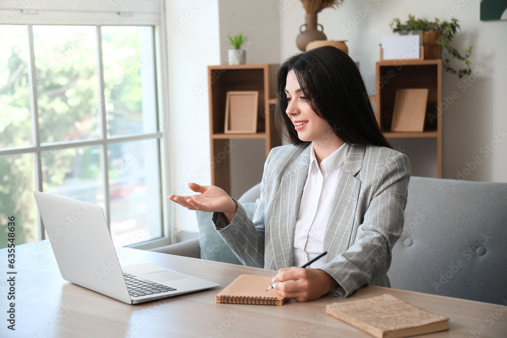 Beautiful woman having job interview online at home Beautiful woman having job interview online at home