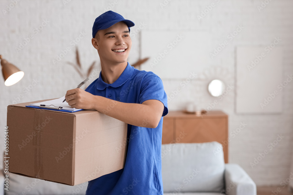 Young courier with parcel and clipboard in room Young courier with parcel and clipboard in room