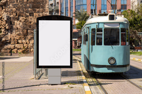 Blank street retail display for outdoor advertisement next to tram stop in Antaliya, Türkiye. photo