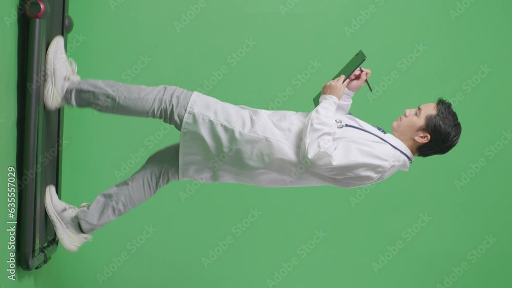 Full Body Of Side View Asian Male Doctor With Stethoscope Holding A Tablet While Walking On Green Screen Background In The Hospital
Full Body Of Side View Asian Male Doctor With Stethoscope Holding A Tablet While Walking On Green Screen Background In The Hospital