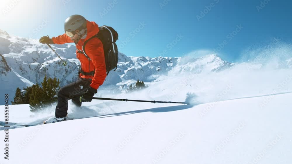 Super Slow Motion of Free Ride Skier in Powder Snow. Filmed on High Speed Cinema Camera, 1000fps. Speed Ramp Effect.