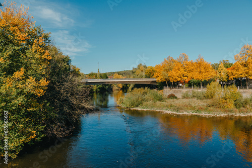 Bridge with river in Bietigheim-Bissingen, Germany. Autumn. viaduct over the Enz River, on a fall summer day. Bietigheim-Bissingen, Germany. Bridge in Bietigheim reflected in the river. Baden