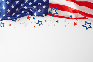 Picturing a vibrant concept for a happy Labor Day celebration. Top view photo of USA national flag, star-shaped confetti on white background with empty space for advert or text
