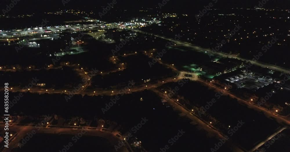 Descending Aerial Over City At Night Street Light Reveal Descending Aerial Over City At Night Street Light Reveal