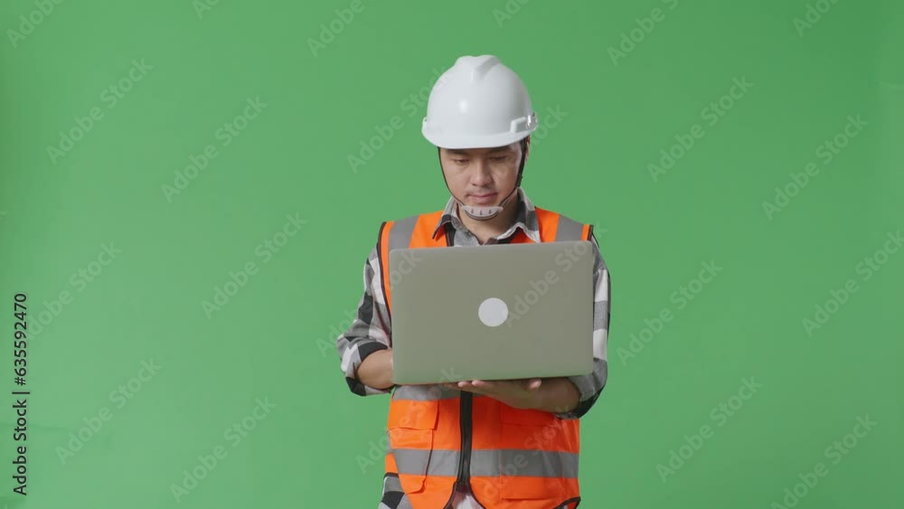 Asian Male Engineer With Safety Helmet Working On A Laptop While Walking In The Green Screen Background Studio
Asian Male Engineer With Safety Helmet Working On A Laptop While Walking In The Green Screen Background Studio