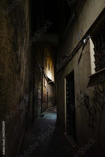 Gloomy narrow street at the night in Terni  Umbria  Italy