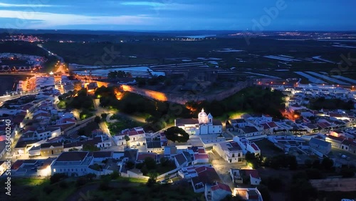 Sunset in Castro Marim. Aerial view from a drone. Lighthouse district. Marshes and salt flats of the Ria Formosa Natural Park. Atlantic Ocean. Algarve. Portugal. Europe photo