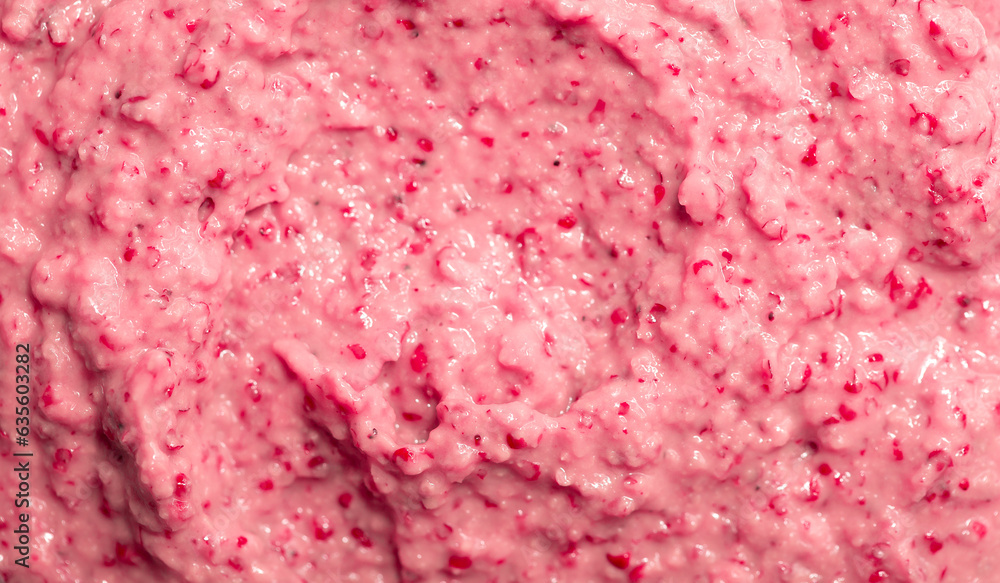 Berry yoghurt ice cream. Smoothies from fresh fruits and berries. Ice cream texture. Delicious sweet dessert close-up as a background. Berry yoghurt ice cream. Smoothies from fresh fruits and berries. Ice cream texture. Delicious sweet dessert close-up as a background.