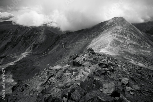 Mountain peak black and white Grays and Torreys Colorado 14er landscape photography hiking trek tourist destination clouds and Rocky Mountains outdoors photo