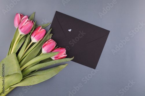  Bouquet of pink tulips. Mothers day, Valentines Day, Birthday celebration concept. Greeting card. Copy space for text, top view
