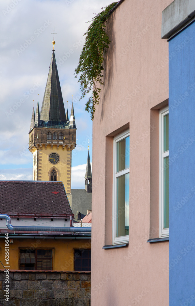 Obraz premium Modern buildings in the historic center of the city next to the baroque castle tower