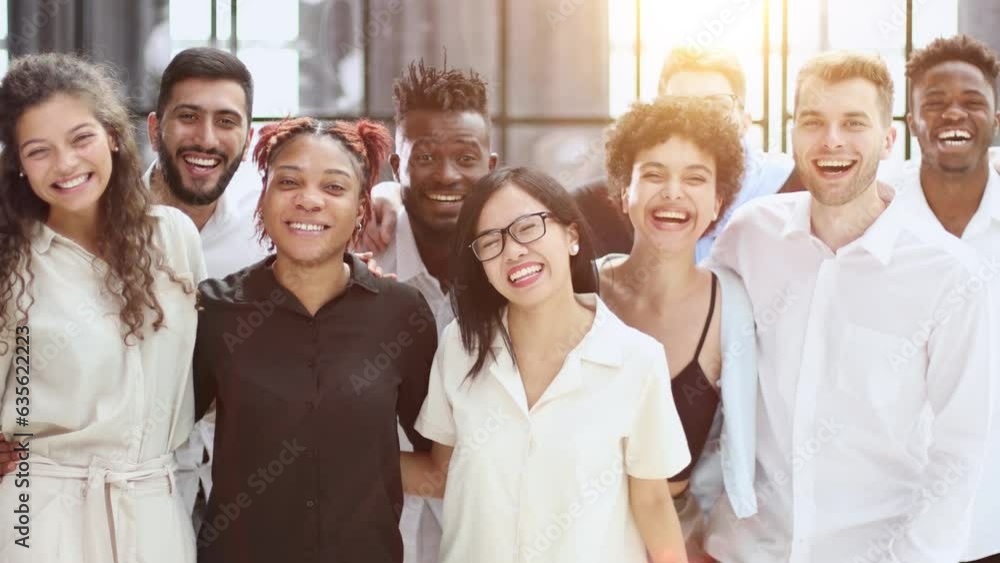 Group of business people standing at the window of a modern office