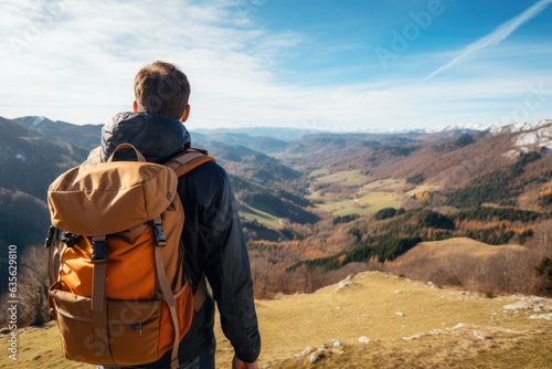 Unrecognizable Young Man With Backpack Hiking