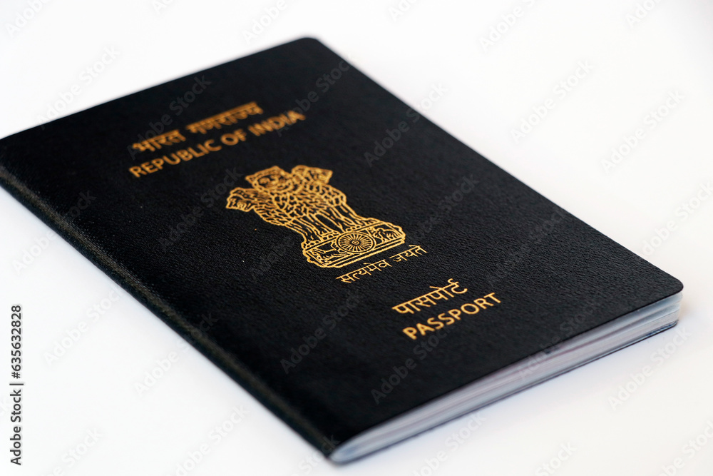 indian national blue passport on a white background in close up indian national blue passport on a white background in close up