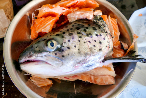 Off cuts and head ready to be used to make salmon fish stock
 photo