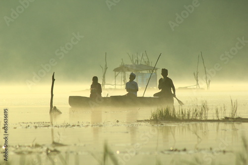 Golden Foggy Morning in Tamblingan Lake, Bali Indonesia