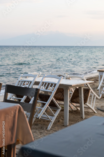 empty traditional seaside restaurant tables