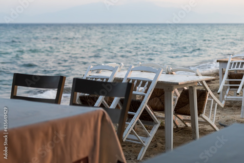 empty traditional seaside restaurant tables © aerogondo