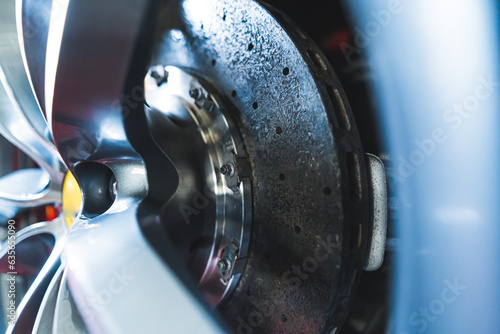 closeup shot of Ceramic disc brakes, car detailing concept. High quality photo © PoppyPix
