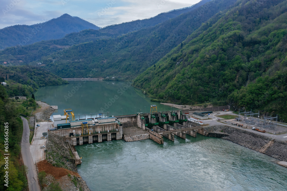 Dam of Kirnati Hydroelectric power plant on Chorokh river, Georgia, aerial drone view