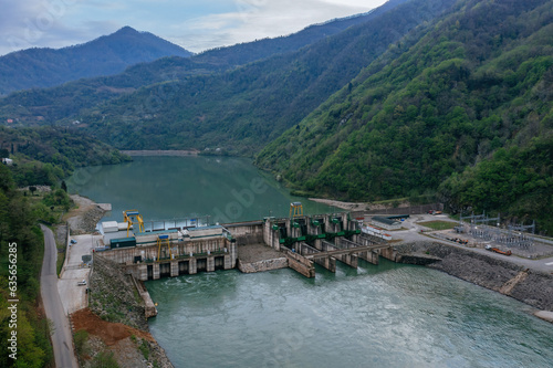Dam of Kirnati Hydroelectric power plant on Chorokh river, Georgia, aerial drone view