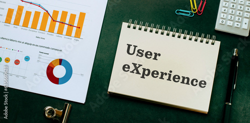 There is notebook with the word User eXperience. It is as an eye-catching image.