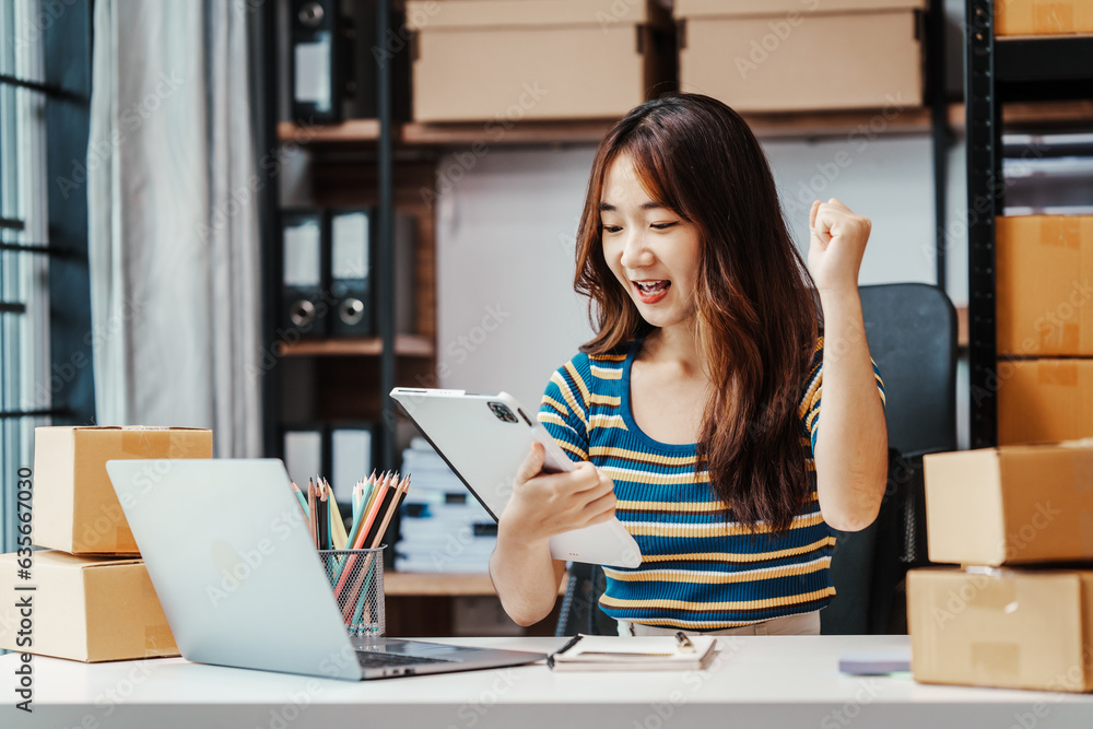 Excited Asians start small businesses, SME entrepreneurs, distribution warehouses with post boxes. owner's small home office, fresh graduate, social media influencers impact on society Excited Asians start small businesses, SME entrepreneurs, distribution warehouses with post boxes. owner's small home office, fresh graduate, social media influencers impact on society
