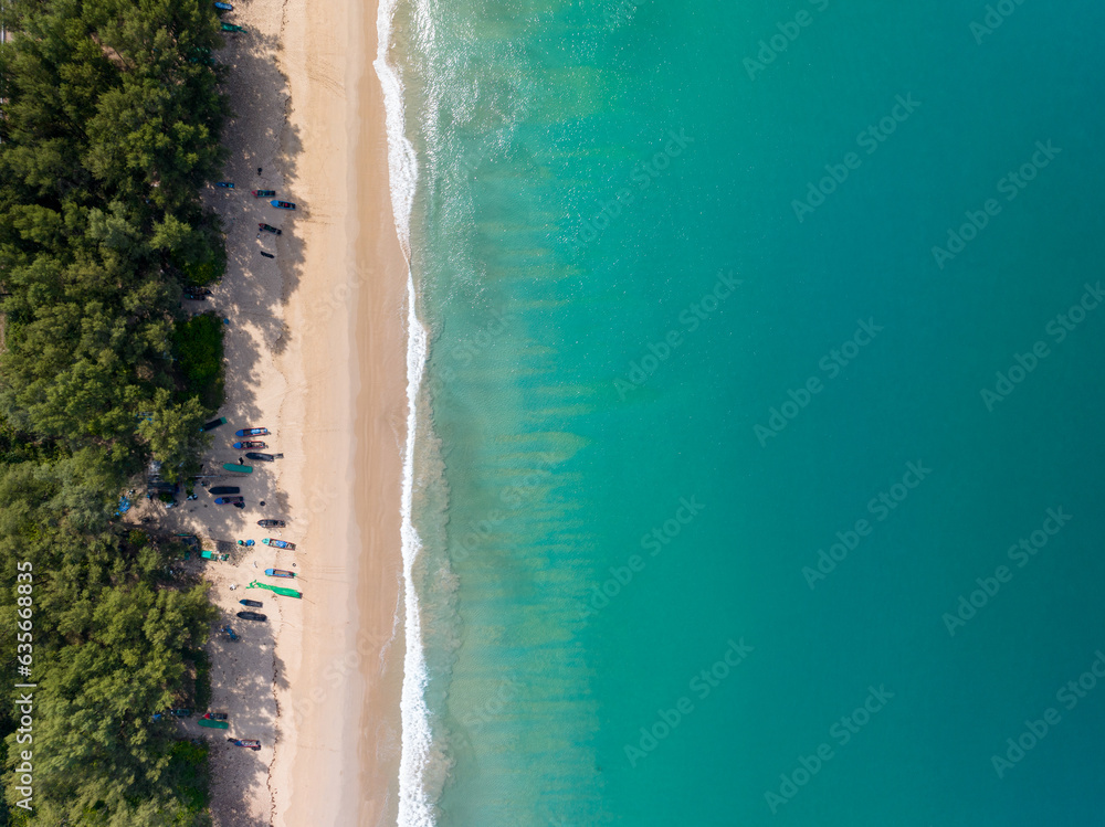 Sea surface aerial view,Bird eye view photo of crashing waves on sandy shore,Beach sea water surface texture,sea sand background,Beautiful nature seascape,Amazing top view beach background