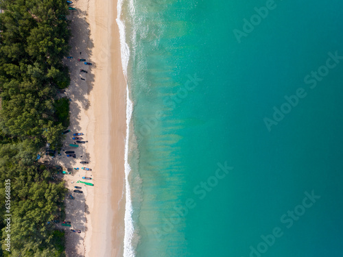 Sea surface aerial view Bird eye view photo of crashing waves on sandy shore Beach sea water surface texture sea sand background Beautiful nature seascape Amazing top view beach background