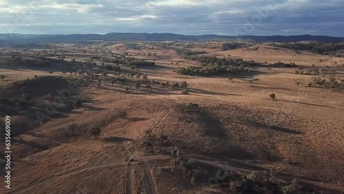 Landscape Australian Outback Drone Flyover, slowly dropping down from the horizon over farmland 40 seconds (ID: 635669009)