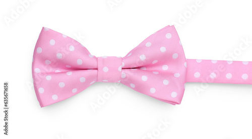 Stylish pink bow tie with polka dot pattern on white background, top view