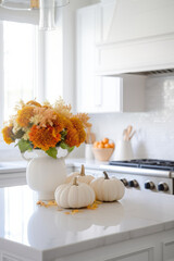 White modern kitchen decorated for fall with orange pumpkins and leaves, generative AI
