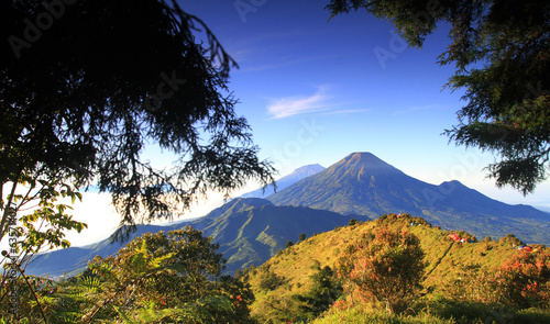 Beautiful view of Mount prau, blue sky and sunrise in the Dieng, Wonosobo, Central Java, Indonesia, August 13, 2023 photo